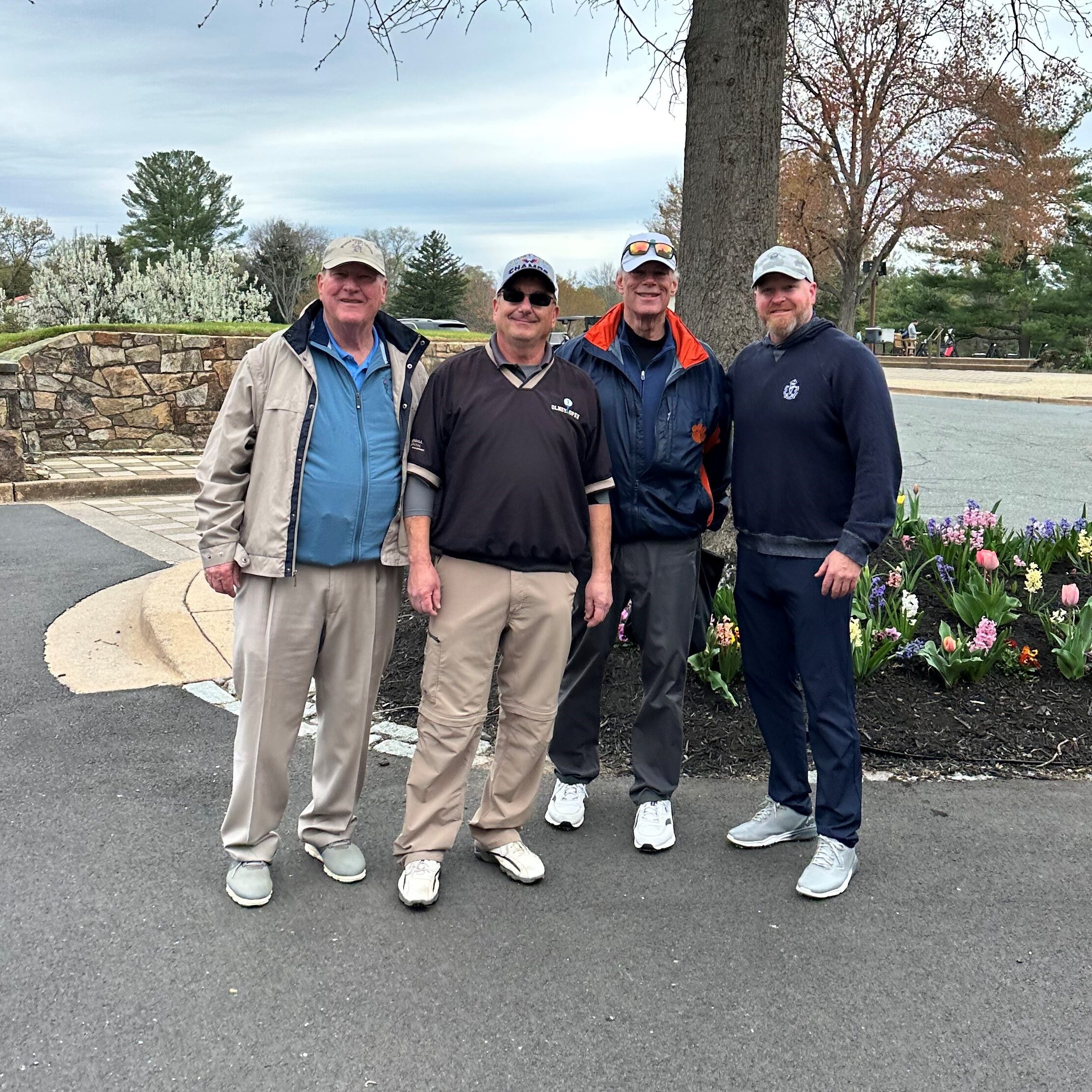 Derek Harman with 3 golfers