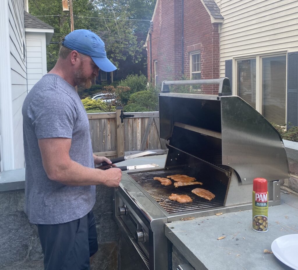 Derek Harman at the grill