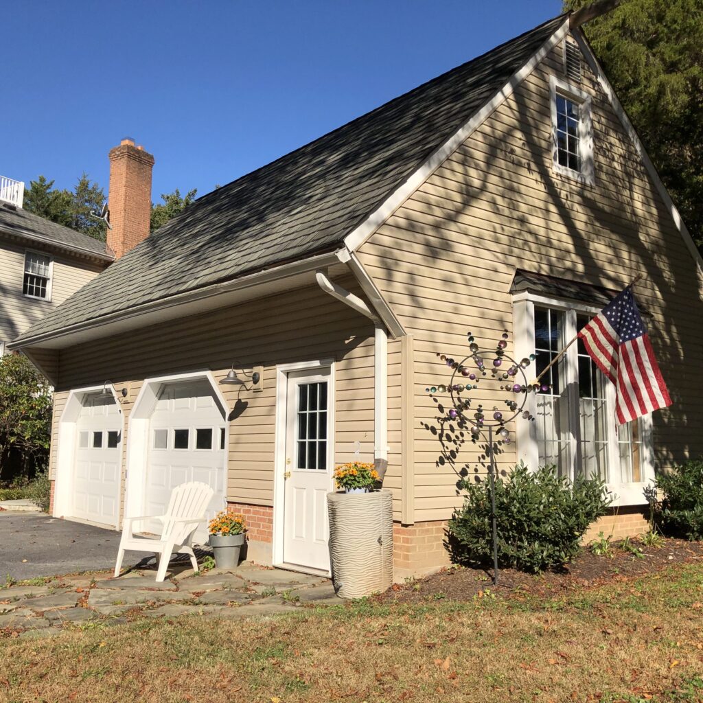 Garage with US flag for fall home maintenance