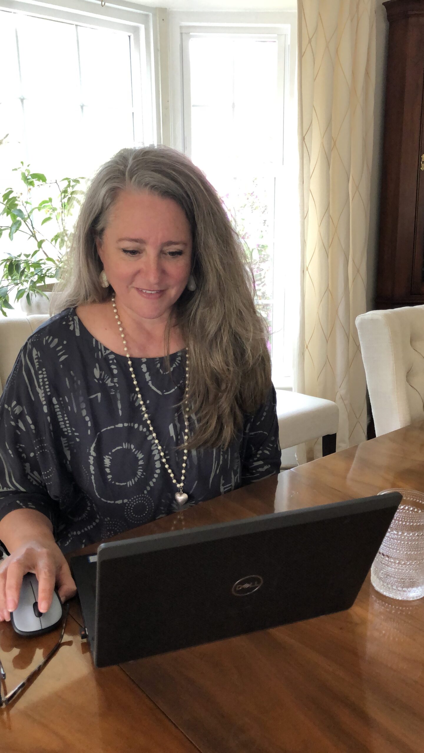 Kellie working at laptop