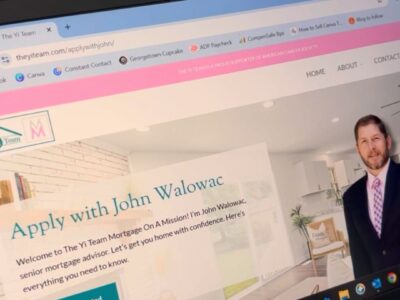 Laptop opened to loan application forms