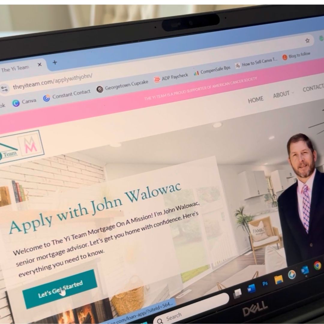 Laptop opened to loan application forms